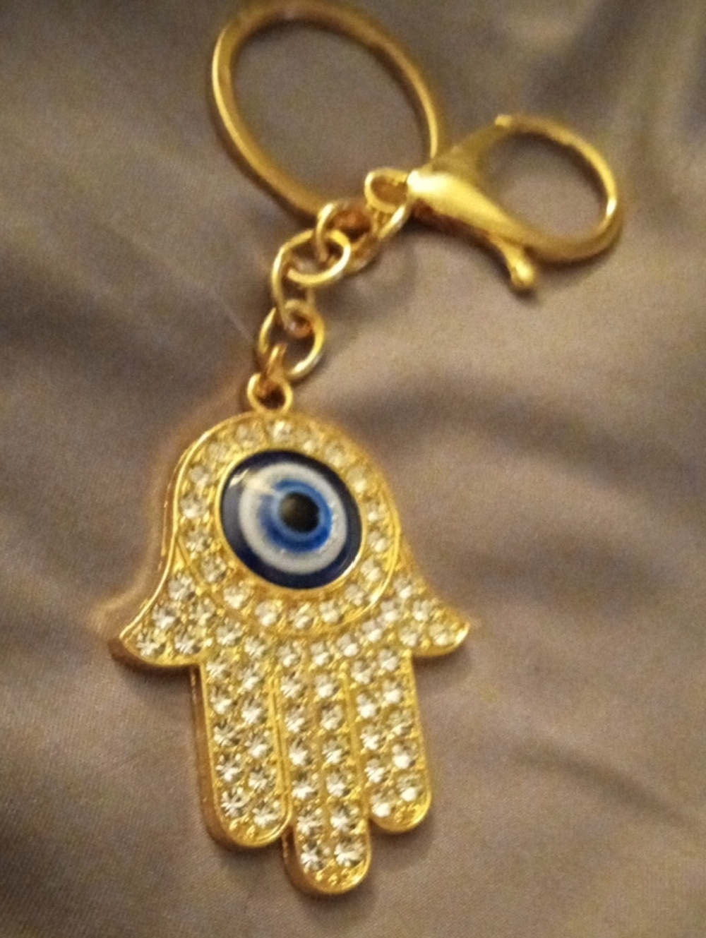 Gold Hamsa Hand Keychain with Blue Evil Eye Accent